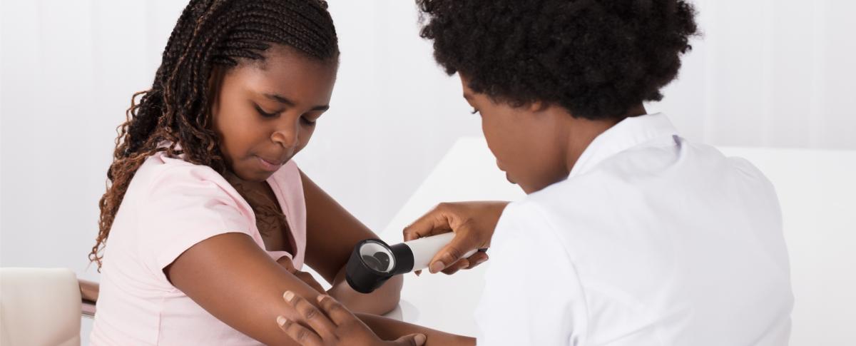 Doctor Examining Child