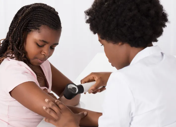 Doctor Examining Child